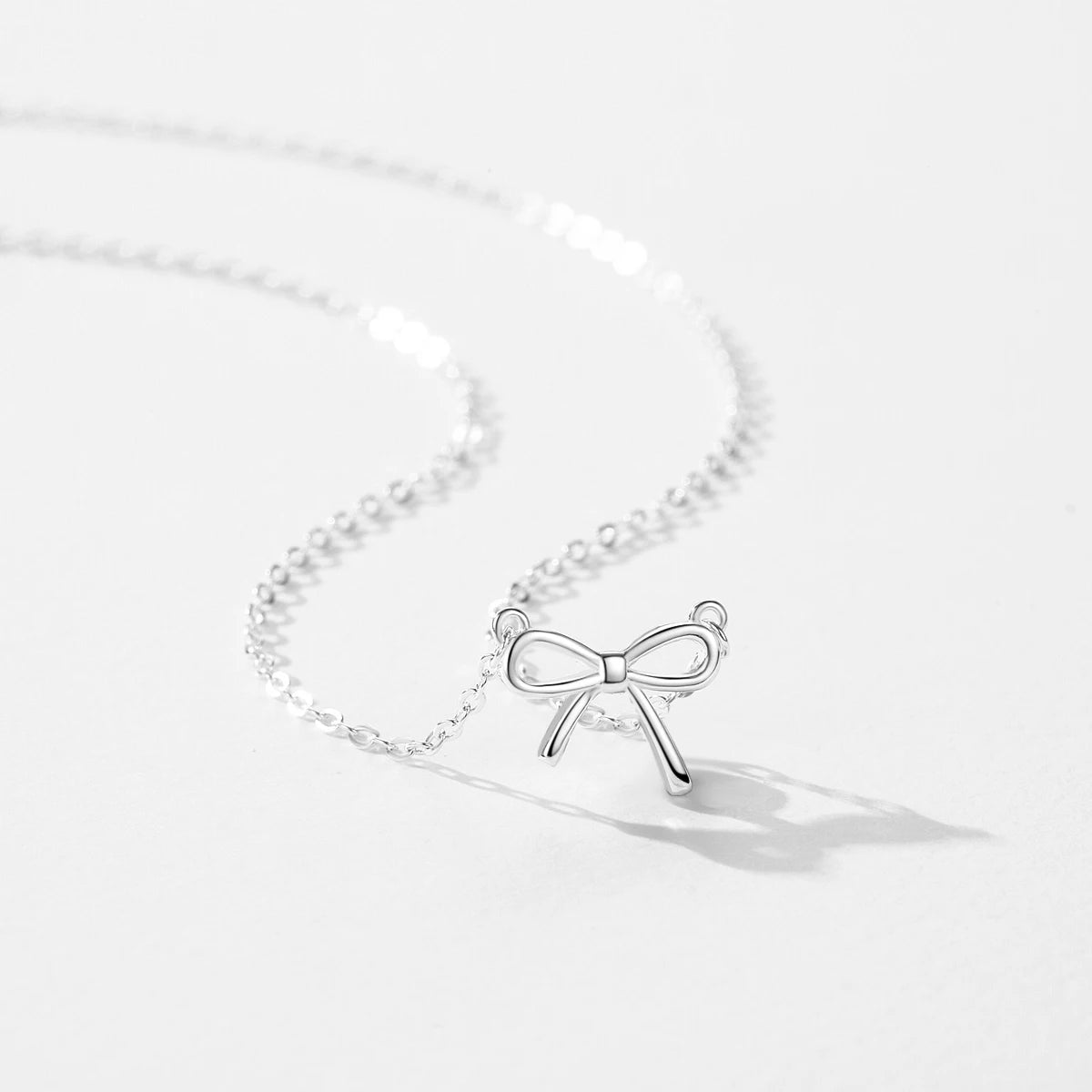 Sterling Silver Exquisite Simple Bowknot Pendant Necklace